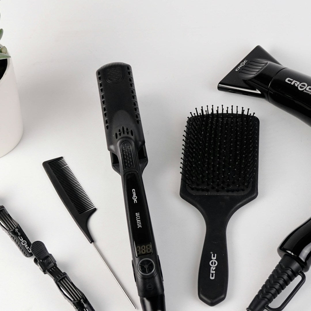 Flat iron, brushes, comb and hair dryer